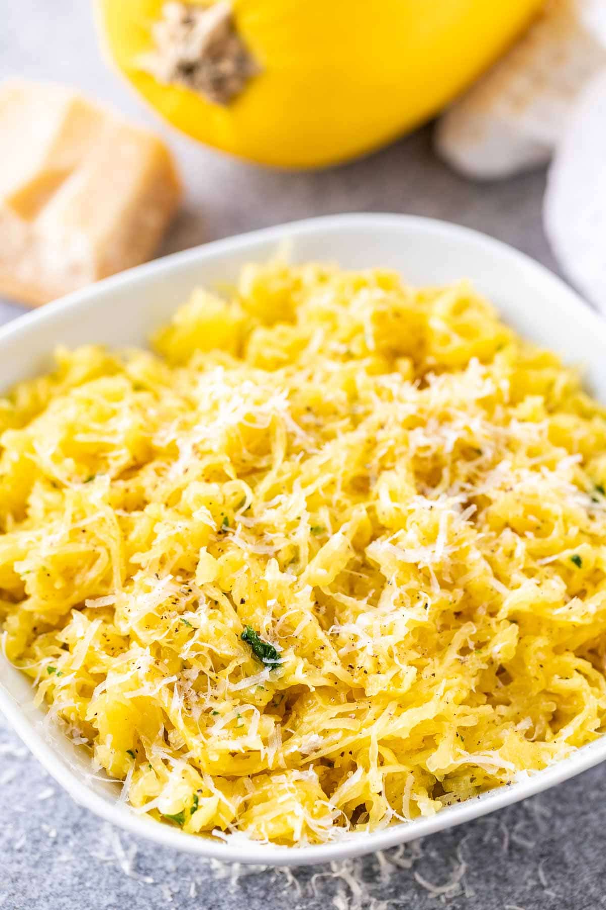 Strands of baked spaghetti squash on a plate
