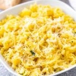 Strands of baked spaghetti squash on a plate