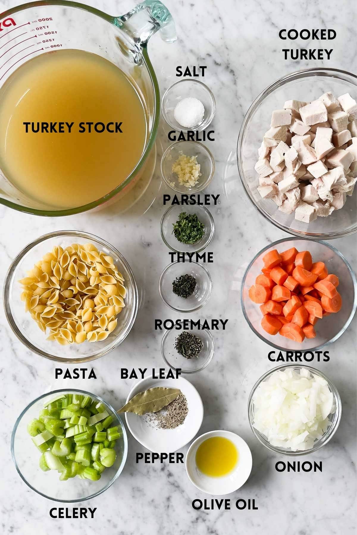 Ingredients for turkey soup in small bowls