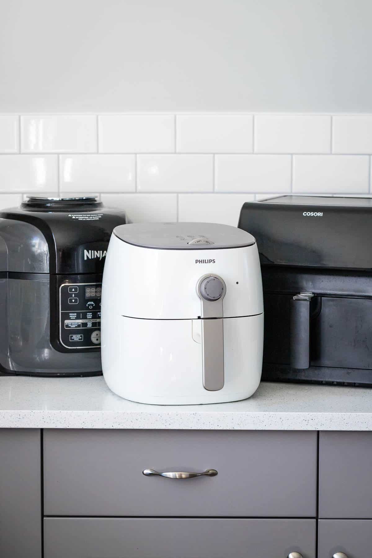 Three Air Fryers on a kitchen counter