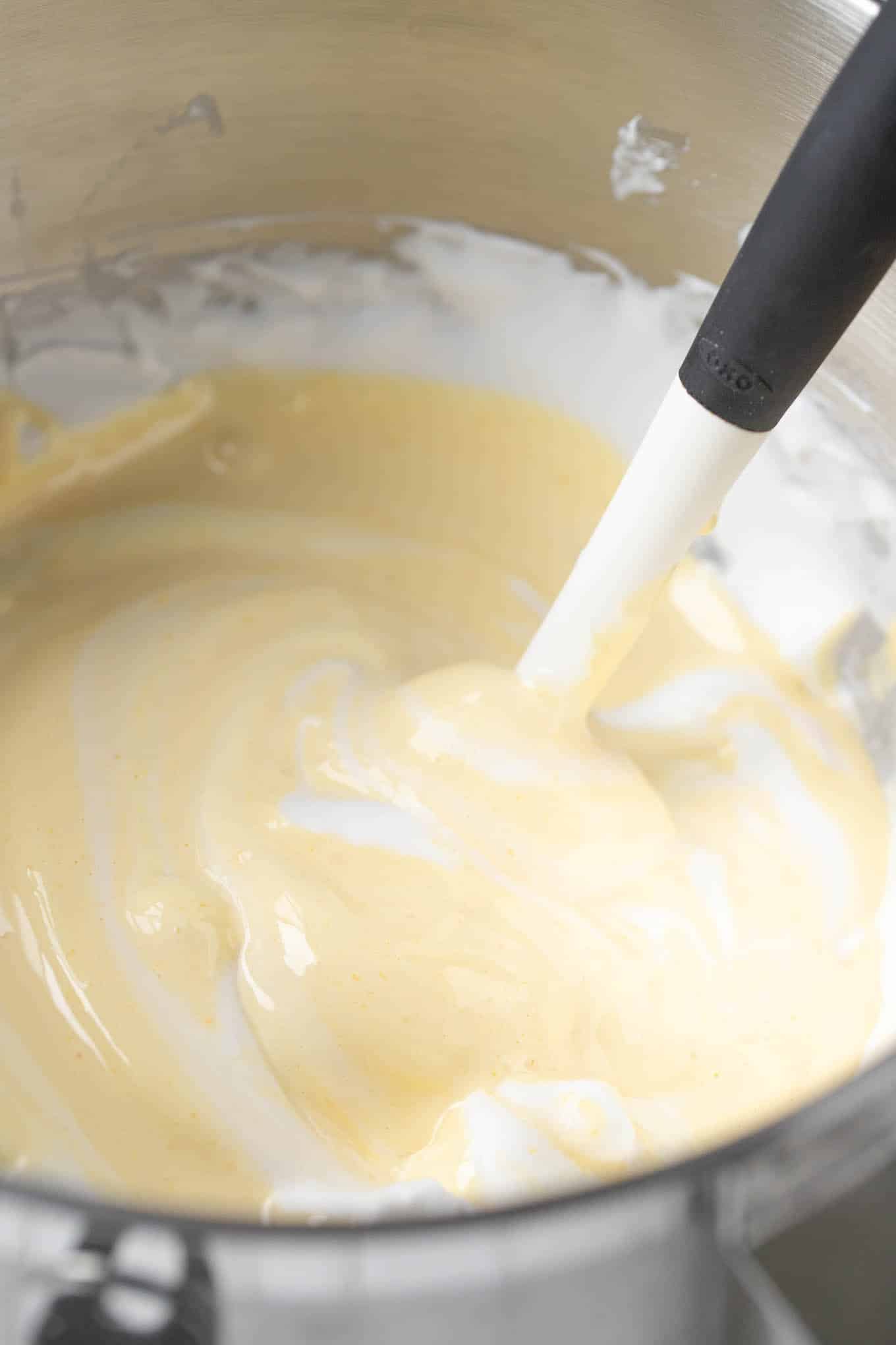 Egg yolk and egg white mixture in a bowl.