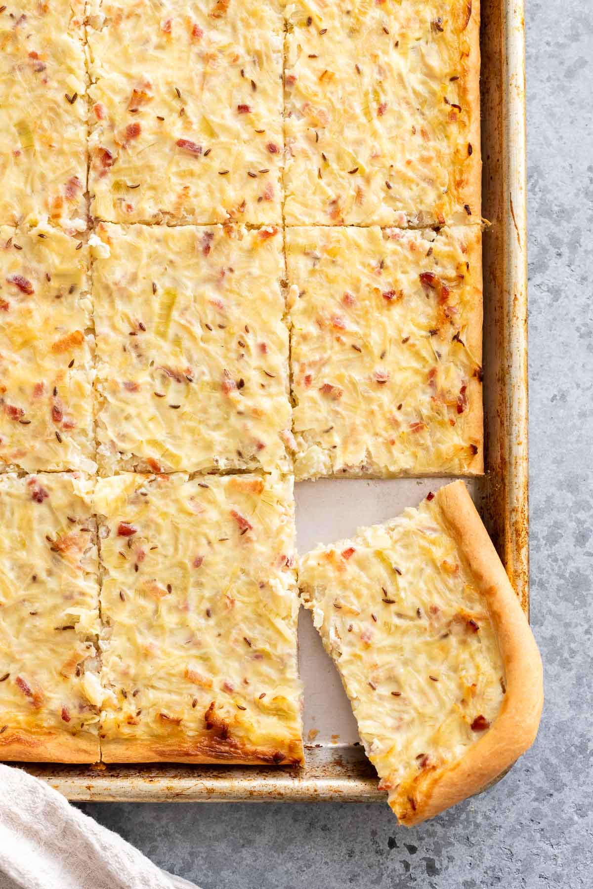 German Onion Pie on a baking sheet.