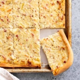 German Onion Pie on a baking sheet.