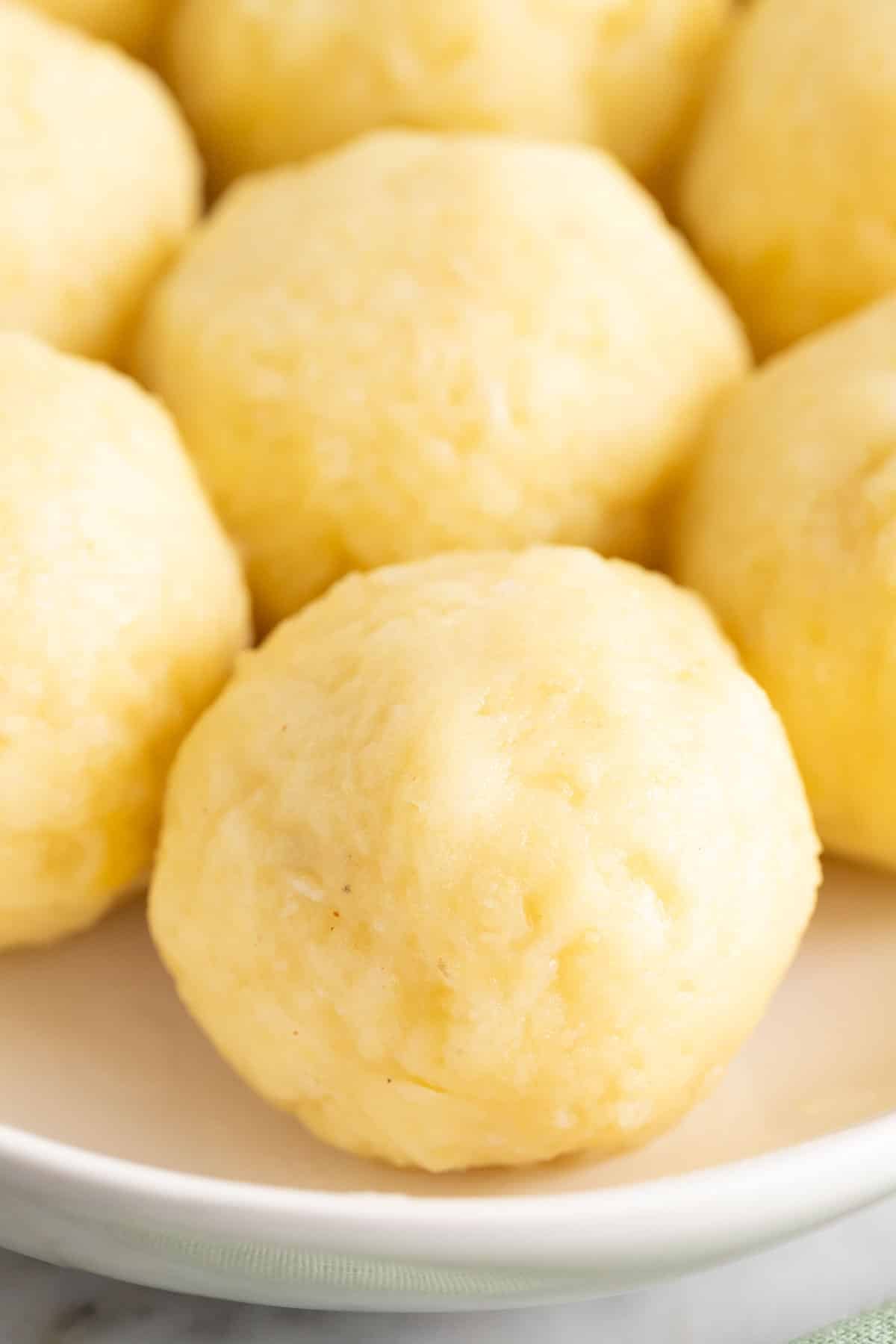 Kartoffelkloesse on a plate.